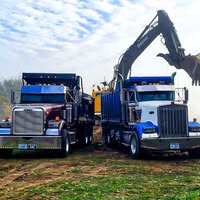 Heavy equipment transport trucks
